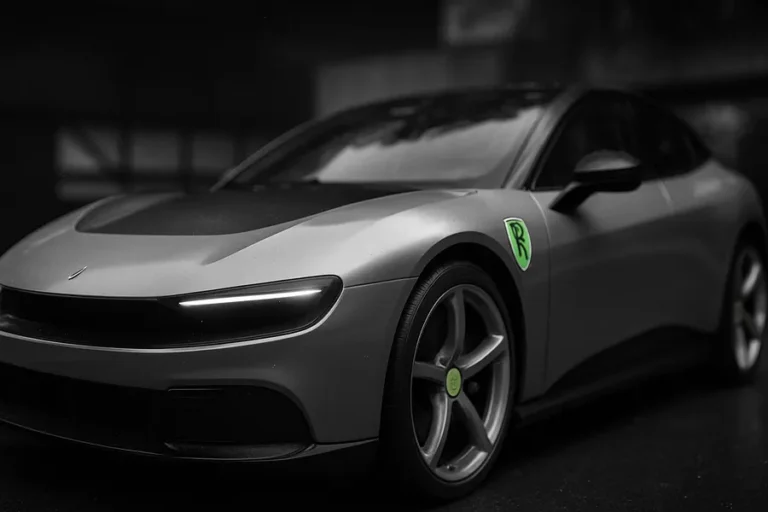 A Ferrari electric vehicle parked in front of a modern building.